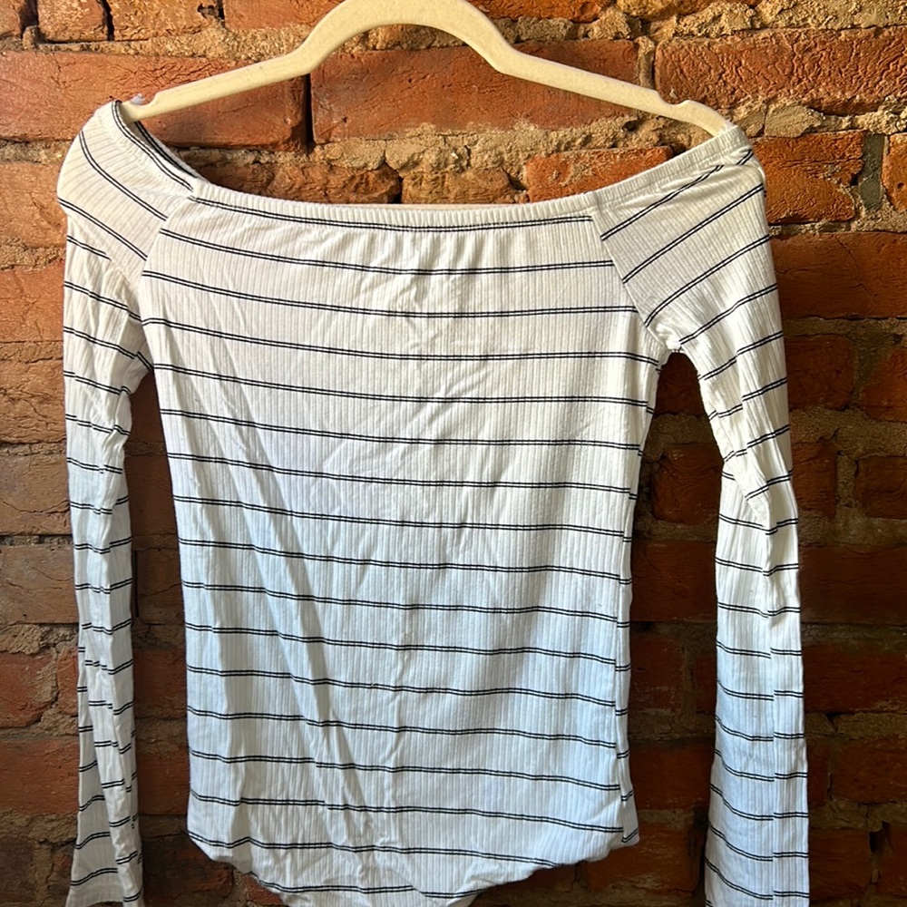 Lulus black and white stripped body suit- open shoulders